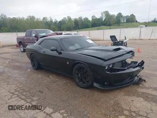 2016 Dodge Challenger R/T Scat Pack z VIN 2C3CDZFJ4GH118973, wystawiony jako IAAI lot #41960654 z przebiegiem 180 315 mil mil oraz . Historia ofert i sprzedaży dostępna na DreamBid. Obrazek 1.