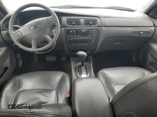 2001 Ford Taurus SEL with VIN 1FAFP56S01A258399, listed as a Copart auction lot 58963115 with 162,989 mi miles and Salvage title. Bid and sale history available at DreamBid. Image 8.
