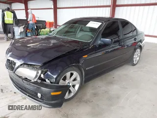 2002 BMW 3 Series 325i with VIN WBAET37412NG79855, listed as a IAAI auction lot 41916316 with 232,702 mi miles. Bid and sale history available at carsss.com. Image 2.