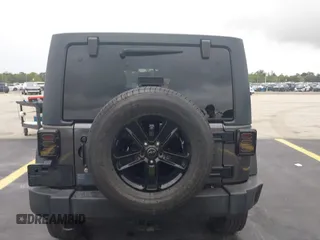 2018 Jeep Wrangler Unlimited Sport S with VIN 1C4BJWDG1JL810754, listed as a IAAI auction lot 42419199 with 74,901 mi miles and . Bid and sale history available at DreamBid. Image 16.
