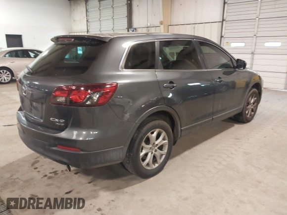 2014 Mazda CX-9 Sport with VIN JM3TB3BV3E0434817, listed as a IAAI auction lot 41394036 with 157,304 mi miles. Bid and sale history available at carsss.com. Image 4.