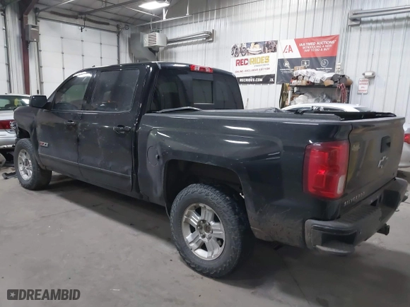 2017 Chevrolet Silverado 1500 LTZ with VIN 3GCUKSEJ3HG382718, listed as a IAAI auction lot 41426789 with 145,620 mi miles. Bid and sale history available at carsss.com. Image 3.