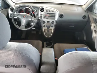 2004 Pontiac Vibe with VIN 5Y2SL62824Z459649, listed as a Copart auction lot 59057345 with 220,515 mi miles and Salvage title. Bid and sale history available at DreamBid. Image 8.
