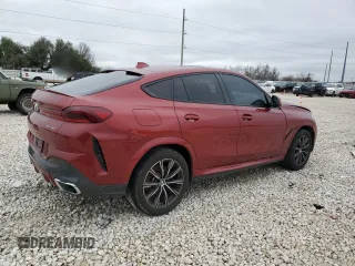 2021 BMW X6 sDrive40i z VIN 5UXCY4C01M9G08122, wystawiony jako Copart lot #44947865 z przebiegiem 90 011 mil mil oraz Szkody całkowita. Historia ofert i sprzedaży dostępna na DreamBid. Obrazek 3.