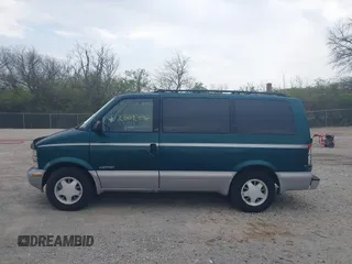 1997 Chevrolet Astro with VIN 1GNDM19W9VB205001, listed as a IAAI auction lot 42002535 with 136,734 mi miles. Bid and sale history available at carsss.com. Image 14.
