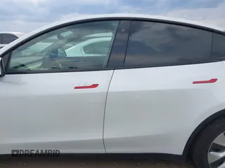 2023 Tesla Model Y Long Range with VIN 7SAYGDEE2PF765395, listed as a IAAI auction lot 41688080 with 27,792 mi miles and . Bid and sale history available at DreamBid. Image 14.