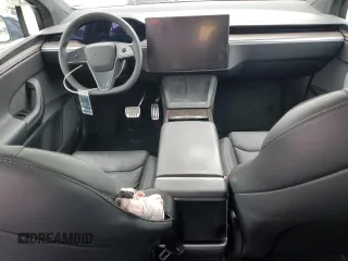 2023 Tesla Model X with VIN 7SAXCDE51PF415778, listed as a Copart auction lot 51792205 with Not Provided miles and Salvage Title. Bid and sale history available at DreamBid. Image 8.