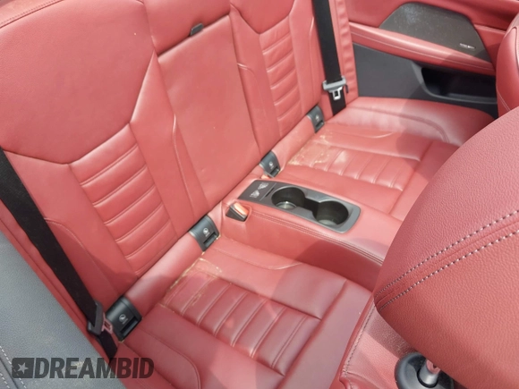 2021 BMW 4 Series M440i with VIN WBA53AT05MCG89665, listed as a IAAI auction lot 42319456 with Not provided miles and . Bid and sale history available at DreamBid. Image 8.