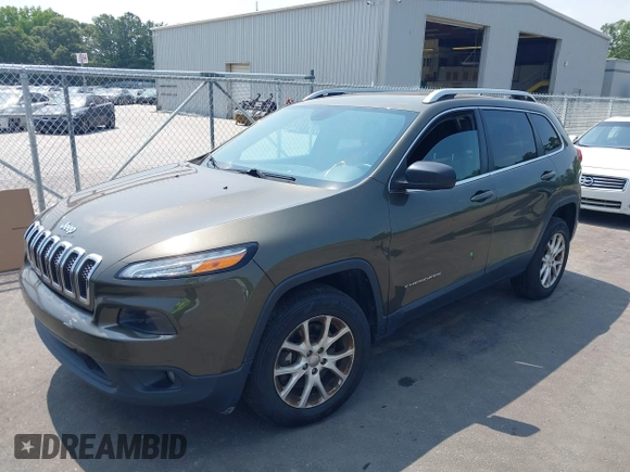 2015 Jeep Cherokee Latitude z VIN 1C4PJMCS9FW551694, wystawiony jako IAAI lot #42424992 z przebiegiem 125 852 mil mil oraz . Historia ofert i sprzedaży dostępna na DreamBid. Obrazek 2.