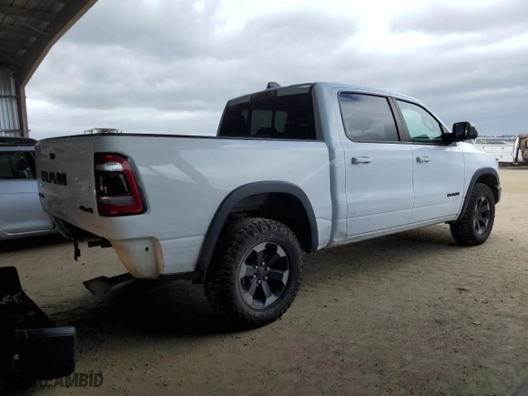 2019 Ram 1500 Rebel with VIN 1C6SRFLTXKN618849, listed as a Copart auction lot 50419595 with 98,219 mi miles and Salvage Title. Bid and sale history available at carsss.com. Image 3.