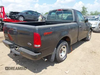 2000 Ford F-150 XL z VIN 1FTZF1724YNB61775, wystawiony jako IAAI lot #42580708 z przebiegiem 164 798 mil mil oraz . Historia ofert i sprzedaży dostępna na DreamBid. Obrazek 4.