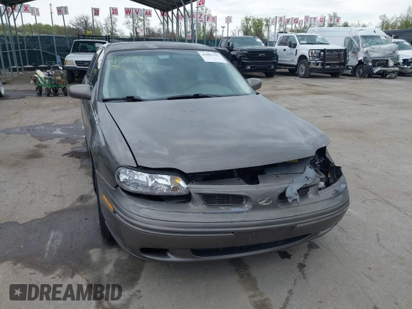 1999 Oldsmobile Cutlass GLS z VIN 1G3NG52J1X6338096, wystawiony jako IAAI lot #42001327 z przebiegiem 77 452 mil mil oraz . Historia ofert i sprzedaży dostępna na DreamBid. Obrazek 13.
