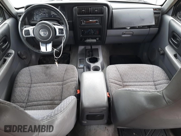1998 Jeep Cherokee SE with VIN 1J4FT28S8WL219020, listed as a Copart auction lot 67757004 with 217,715 mi miles and Salvage Title. Bid and sale history available at carsss.com. Image 8.