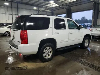 2014 GMC Yukon SLT with VIN 1GKS2CE01ER123696, listed as a Copart auction lot 63401554 with 177,174 mi miles and Salvage Title. Bid and sale history available at carsss.com. Image 3.