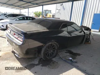 2016 Dodge Challenger R/T Scat Pack z VIN 2C3CDZFJ3GH284689, wystawiony jako Copart lot #54417855 z przebiegiem 139 940 mil mil oraz Szkoda całkowita • Salvage title. Historia ofert i sprzedaży dostępna na DreamBid. Obrazek 3.