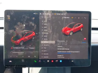 2023 Tesla Model Y Long Range z VIN 7SAYGAEE7PF691499, wystawiony jako IAAI lot #42038850 z przebiegiem 26 439 mil mil oraz . Historia ofert i sprzedaży dostępna na DreamBid. Obrazek 19.