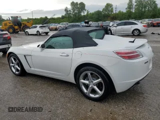 2008 Saturn Sky Red Line z VIN 1G8MG35X98Y102960, wystawiony jako Copart lot #61233914 z przebiegiem 129 890 mil mil oraz Szkody całkowita. Historia ofert i sprzedaży dostępna na DreamBid. Obrazek 2.