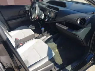 2015 Toyota Prius c One with VIN JTDKDTB39F1111784, listed as a IAAI auction lot 41742858 with 229,809 mi miles. Bid and sale history available at carsss.com. Image 5.