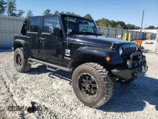 2007 Jeep Wrangler Unlimited Sahara with VIN 1J4GA59197L141821, listed as a Copart auction lot 76897044 with 124,070 mi miles and Salvage title. Bid and sale history available at DreamBid. Image 4.