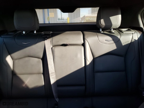 2024 Cadillac XT4 AWD Premium Luxury with VIN 1GYFZDR49RF128402, listed as a Copart auction lot 77630154 with 20,673 mi miles and Salvage Title. Bid and sale history available at carsss.com. Image 10.