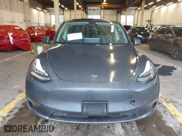 2020 Tesla Model Y Long Range z VIN 5YJYGDEE8LF008945, wystawiony jako IAAI lot #41185905 z przebiegiem 31 916 mil mil oraz . Historia ofert i sprzedaży dostępna na DreamBid. Obrazek 12.
