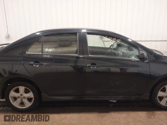 2008 Toyota Yaris with VIN JTDBT903581284634, listed as a IAAI auction lot 40553888 with 180,563 mi miles. Bid and sale history available at carsss.com. Image 13.