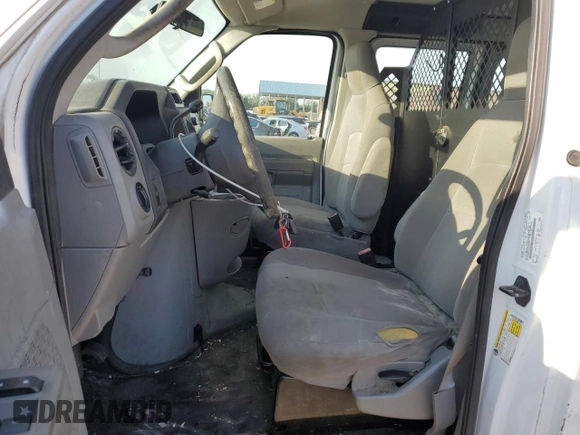 2012 Ford Econoline Cargo Commercial with VIN 1FTNE2EL0CDB33215, listed as a Copart auction lot 63120784 with 258,466 mi miles and Salvage title. Bid and sale history available at DreamBid. Image 7.