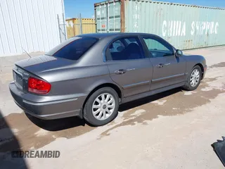 2003 Hyundai Sonata GLS with VIN KMHWF35H03A895363, listed as a IAAI auction lot 42149203 with 152,173 mi miles. Bid and sale history available at carsss.com. Image 4.