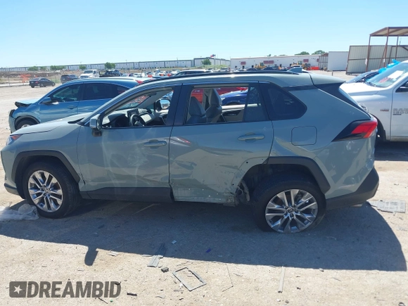 2021 Toyota RAV4 XLE Premium with VIN 2T3C1RFV0MW140682, listed as a IAAI auction lot 42315813 with 98,267 mi miles and . Bid and sale history available at DreamBid. Image 14.
