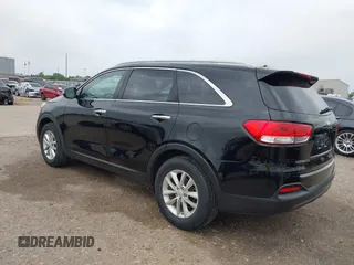 2018 Kia Sorento LX with VIN 5XYPG4A30JG384884, listed as a IAAI auction lot 41931992 with 140,919 mi miles. Bid and sale history available at carsss.com. Image 3.