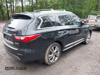 2015 Infiniti QX60 with VIN 5N1AL0MM7FC528002, listed as a IAAI auction lot 42260916 with 228,379 mi miles and . Bid and sale history available at DreamBid. Image 4.