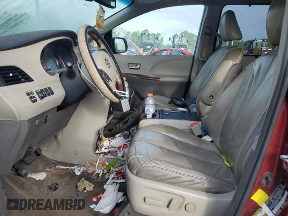 2011 Toyota Sienna XLE with VIN 5TDDK3DCXBS024257, listed as a Copart auction lot 60667145 with 283,609 mi miles and Salvage title. Bid and sale history available at DreamBid. Image 7.