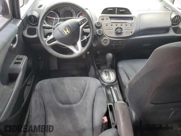 2009 Honda Fit Sport with VIN JHMGE88479S060797, listed as a Copart auction lot 54009135 with 167,914 mi miles and Salvage Title. Bid and sale history available at carsss.com. Image 8.