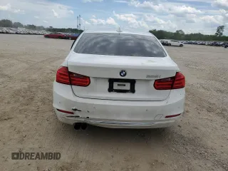 2012 BMW 3 Series 328i with VIN WBA3A5C55CF259337, listed as a Copart auction lot 63327925 with 132,019 mi miles and Salvage title. Bid and sale history available at DreamBid. Image 6.