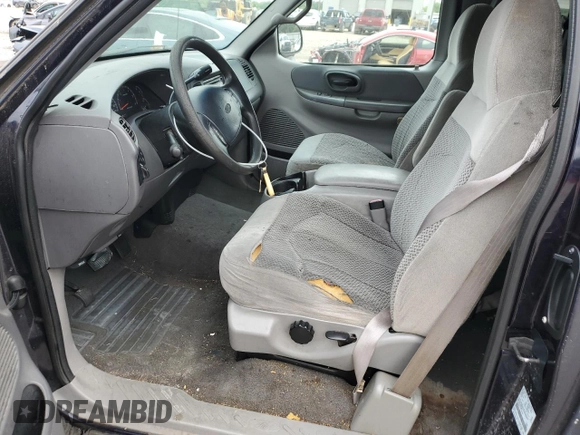 1999 Ford F-150 with VIN 2FTZX1729XCA64069, listed as a Copart auction lot 56246845 with Not provided miles and Salvage title. Bid and sale history available at DreamBid. Image 7.