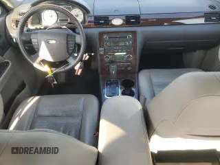 2008 Ford Taurus Limited with VIN 1FAHP25W28G121399, listed as a Copart auction lot 53469565 with 160,764 mi miles and Salvage title. Bid and sale history available at DreamBid. Image 8.