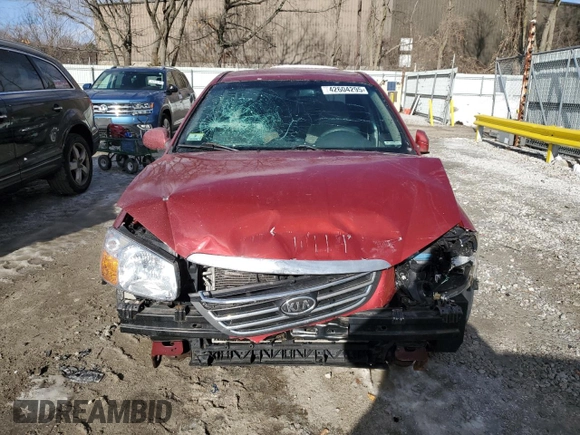 2009 Kia Spectra SX with VIN KNAFE222495661159, listed as a Copart auction lot 42604295 with 123,934 mi miles and Salvage Title. Bid and sale history available at carsss.com. Image 5.