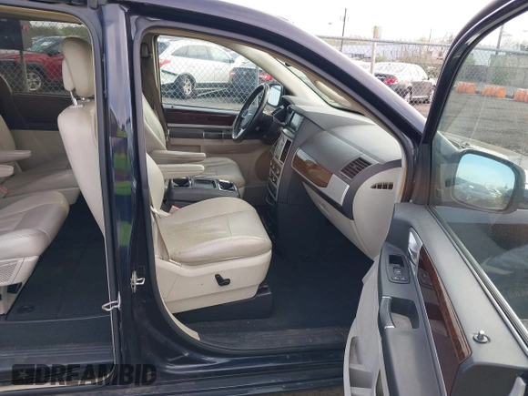 2010 Chrysler Town & Country Touring Plus with VIN 2A4RR8D1XAR480600, listed as a IAAI auction lot 42074257 with 195,154 mi miles and . Bid and sale history available at DreamBid. Image 5.