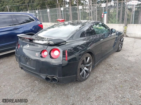 2009 Nissan GT-R Premium with VIN JN1AR54F19M252323, listed as a IAAI auction lot 41814114 with 98,972 mi miles. Bid and sale history available at carsss.com. Image 4.
