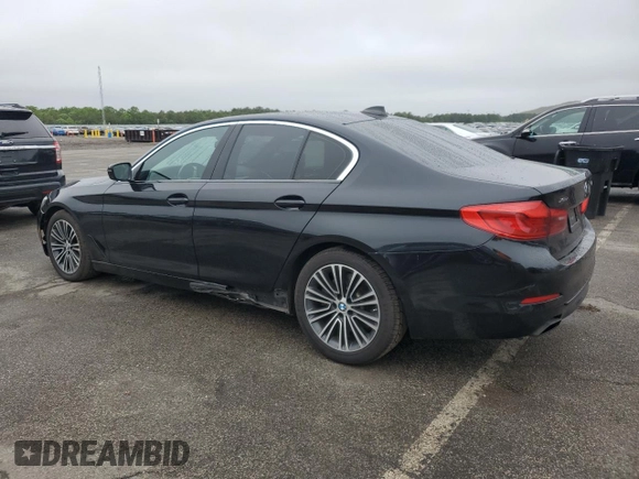 2019 BMW 5 Series 540i xDrive with VIN WBAJE7C54KWW19994, listed as a Copart auction lot 57973055 with 121,995 mi miles and Salvage title. Bid and sale history available at DreamBid. Image 2.