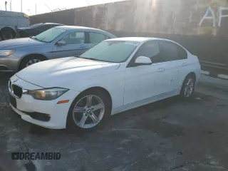 2014 BMW 3 Series 328i with VIN WBA3C1C50EK113389, listed as a Copart auction lot 87317584 with 128,705 mi miles and Salvage Title. Bid and sale history available at carsss.com. Image 1.
