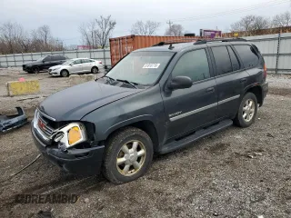2006 GMC Envoy SLT with VIN 1GKDT13S762238764, listed as a Copart auction lot 51815715 with 302,598 mi miles and Salvage Title. Bid and sale history available at carsss.com. Image 1.