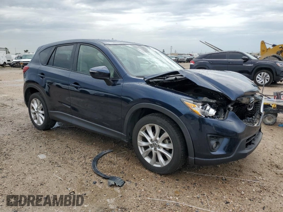 2015 Mazda CX-5 Grand Touring with VIN JM3KE2DY1F0466011, listed as a Copart auction lot 50695165 with 51,967 mi miles and Salvage Title. Bid and sale history available at carsss.com. Image 4.