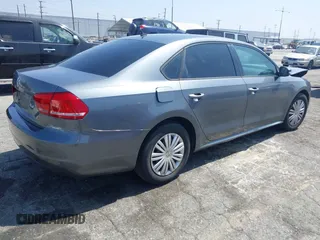 2014 Volkswagen Passat S with VIN 1VWAP7A3XEC003928, listed as a IAAI auction lot 42483100 with 132,117 mi miles and . Bid and sale history available at DreamBid. Image 4.
