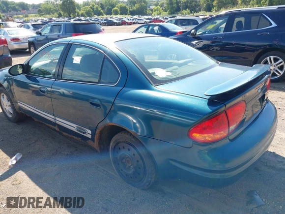 2003 Oldsmobile Alero GL1 z VIN 1G3NL52F53C153441, wystawiony jako IAAI lot #39799738 z przebiegiem 180 025 mil mil oraz . Historia ofert i sprzedaży dostępna na DreamBid. Obrazek 3.