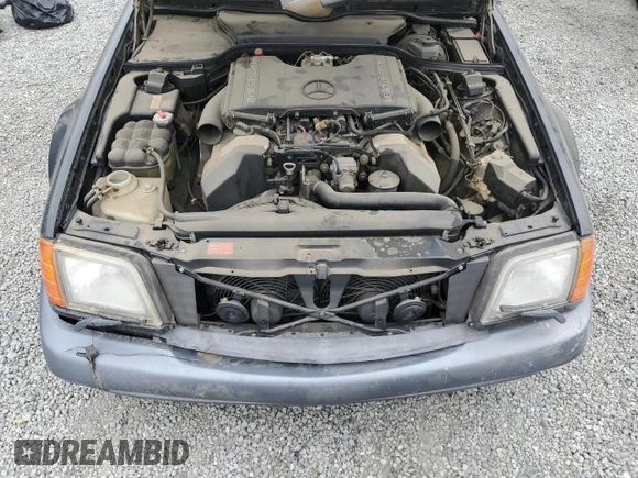 1990 Mercedes-Benz 500 z VIN WDBFA66E2LF013247, wystawiony jako Copart lot #53387305 z przebiegiem 121 472 mil mil oraz Szkoda całkowita • Salvage title. Historia ofert i sprzedaży dostępna na DreamBid. Obrazek 11.