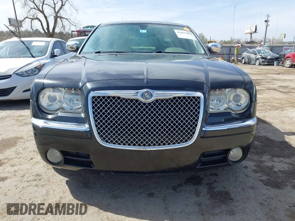 2009 Chrysler 300 C z VIN 2C3LA63T39H612810, wystawiony jako IAAI lot #41827898 z przebiegiem 76 558 mil mil oraz . Historia ofert i sprzedaży dostępna na DreamBid. Obrazek 13.