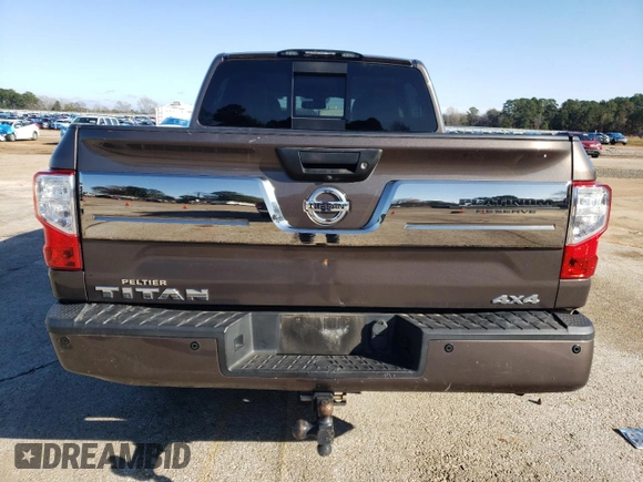 2017 Nissan Titan SL z VIN 1N6AA1E54HN512447, wystawiony jako Copart lot #85330734 z przebiegiem 119 424 mil mil oraz Czysty tytuł • Clean title. Historia ofert i sprzedaży dostępna na DreamBid. Obrazek 6.