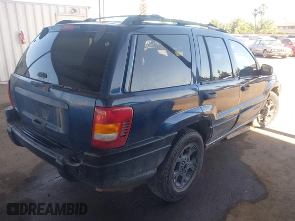 2000 Jeep Grand Cherokee Laredo with VIN 1J4G248SXYC274865, listed as a IAAI auction lot 42542922 with 185,902 mi miles and . Bid and sale history available at DreamBid. Image 4.