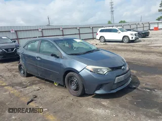 2016 Toyota Corolla L z VIN 5YFBURHE5GP398906, wystawiony jako IAAI lot #42297455 z przebiegiem 148 554 mil mil oraz . Historia ofert i sprzedaży dostępna na DreamBid. Obrazek 1.